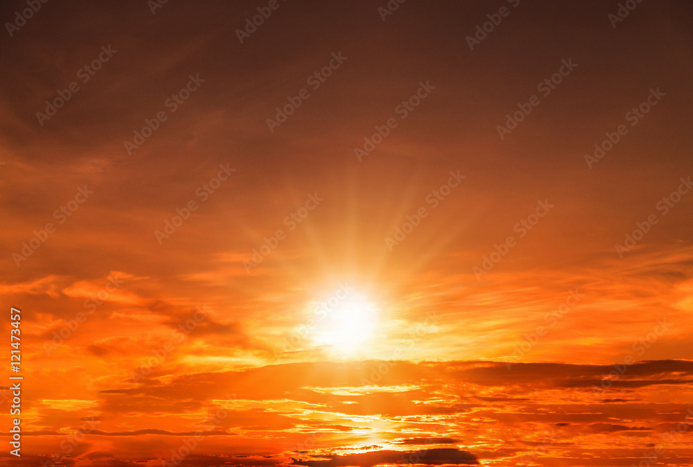 Fototapeta premium Fiery orange sunset sky