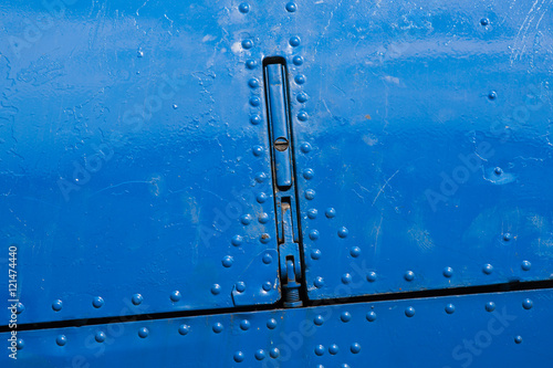 Airplane fuselage area with a lock
