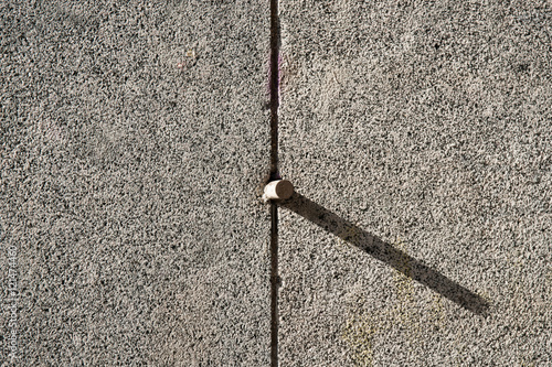 Metal pintle or dowel in a granite wall photo