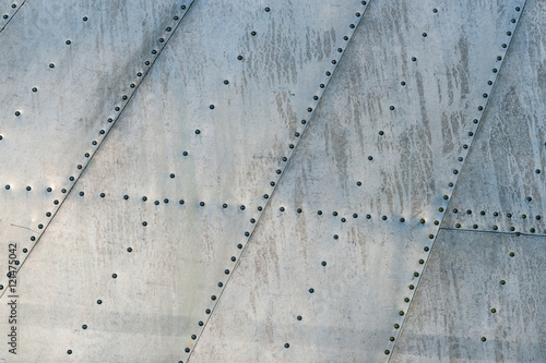 Foto Fuselage area and rivets of a vintage aircraft