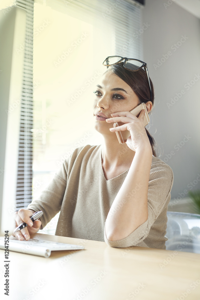 Businesswoman using mobile phone Businesswoman using mobile phone