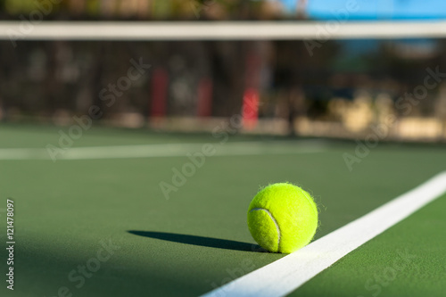 Tennis ball on court baseline © mtsaride