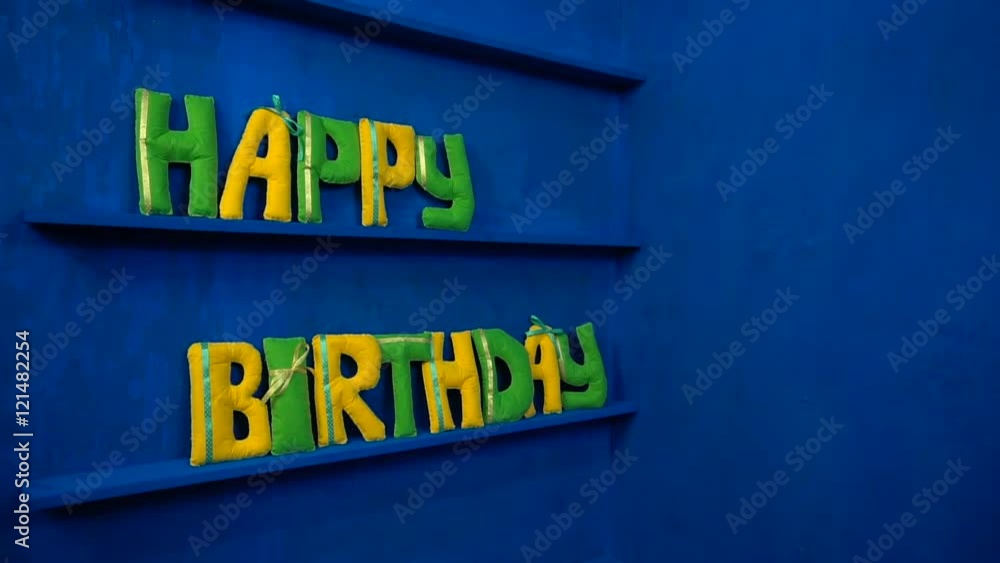 Happy Birthday from felt letters on blue background Happy Birthday from felt letters on blue background