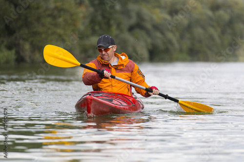 Kayaking on the river. © vetal1983
