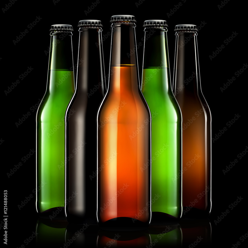 Set of beer bottles with clipping path isolated on black gradient background Set of beer bottles with clipping path isolated on black gradient background