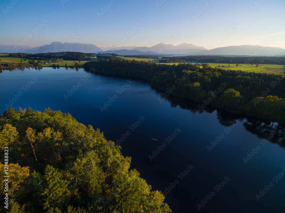 Naklejka premium Aerial: Sunset at lake Abtsee, Bavaria