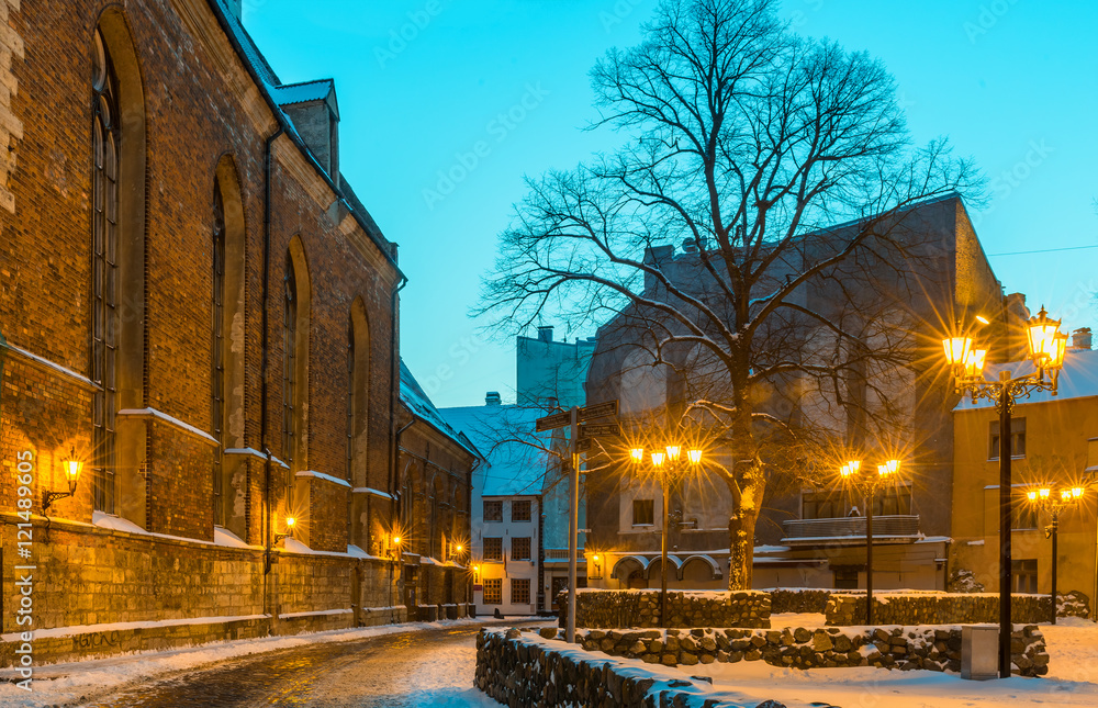 Old Riga city by winter night. Riga is a famous European tourist city with unique medieval and Gothic architecture