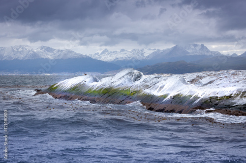 The stone island in the ocean. Near Ushuaia, Argentina