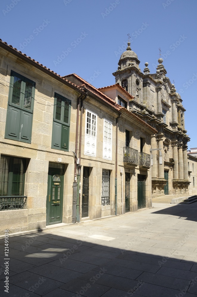Street with traditional houses and the Bartholomew Church  in Pontevedra, Spain