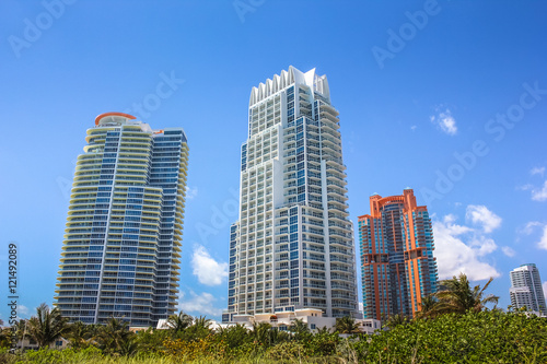 Miami skyscrapers. Miami South Beach in Downtown District in sunny day. Apartment and business buildings in Miami Beach  Florida.
