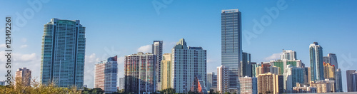 Panorama of Miami skyscrapers and skyline. Miami South Beach in Downtown District in sunny day. Apartment and business buildings in Miami Beach  Florida.