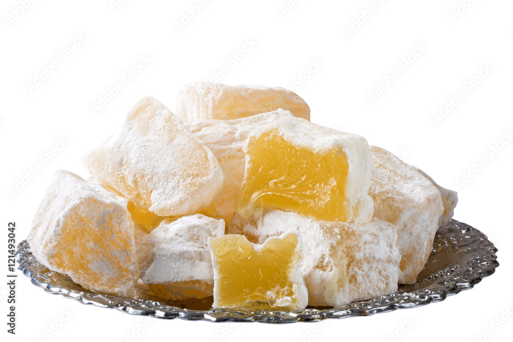 Sweet Turkish delight lokum traditional dessert on turkish plate Sweet Turkish delight lokum traditional dessert on turkish plate
