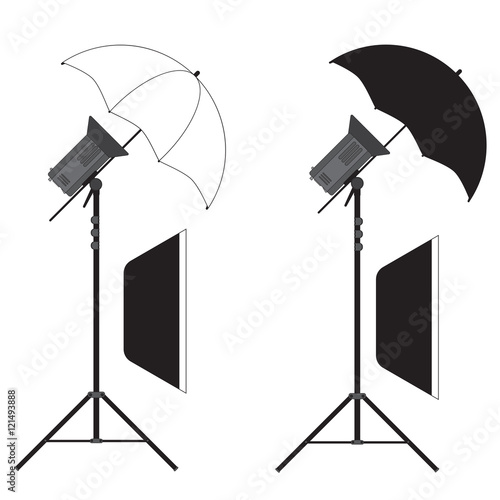 Studio strobe light flashes with umbrella and soft-boxes