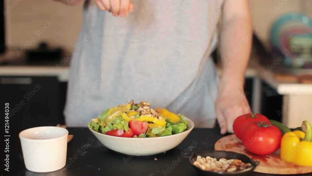 Man Prepares Vegetarian Vegetable Salad at Home Man Prepares Vegetarian Vegetable Salad at Home