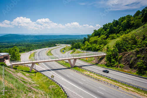 View of I-68 and a pedestrian bridge at Sideling Hill, Maryland.