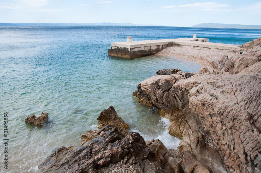 coast of tucepi mare stones and blue sky