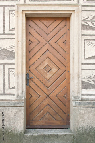 Old wooden door in italian palazzo