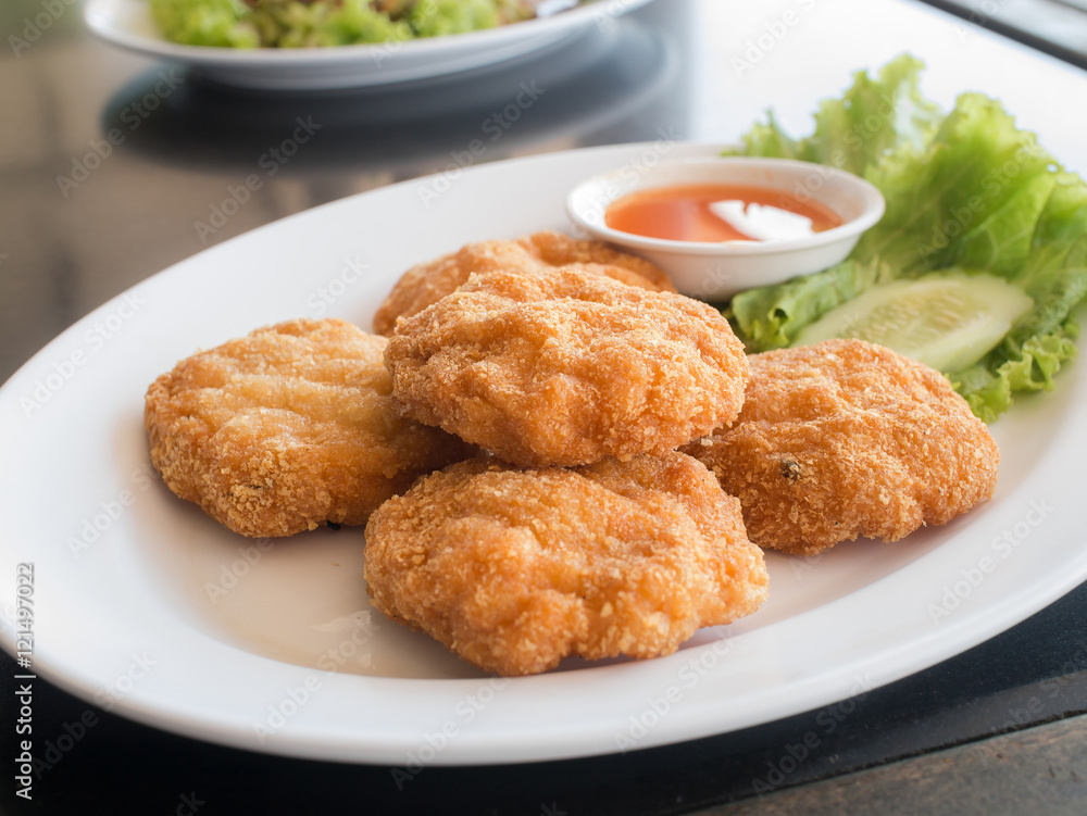 fried fish patty( fried fish-paste balls ) on white plate, Thai food style fried fish patty( fried fish-paste balls ) on white plate, Thai food style