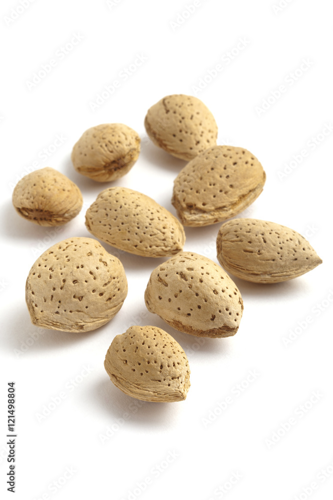 Almond nuts isolated on a white background Almond nuts isolated on a white background