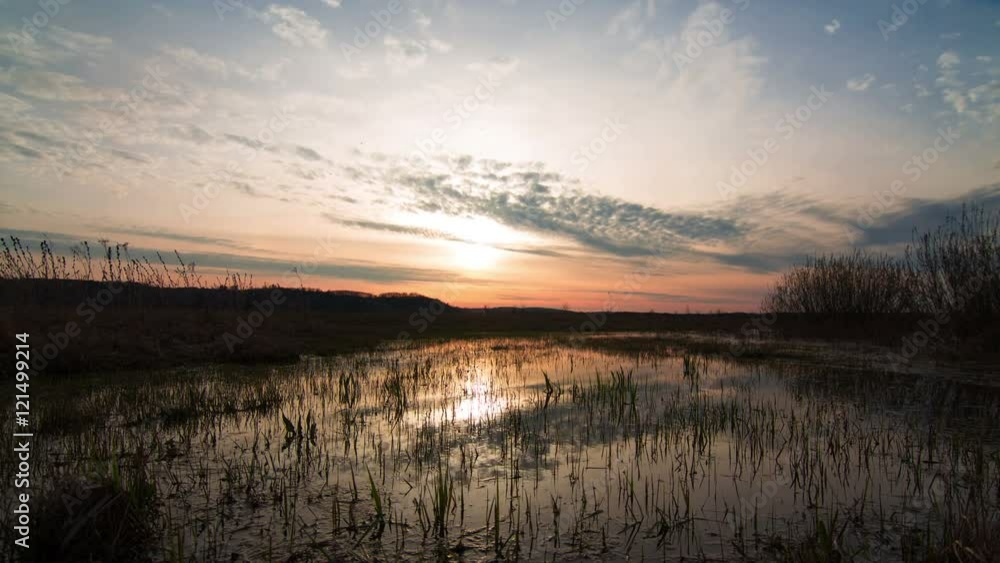 Time lapse Nature Sunset clouds reflected in water. Beautiful landscape Time lapse Nature Sunset clouds reflected in water. Beautiful landscape