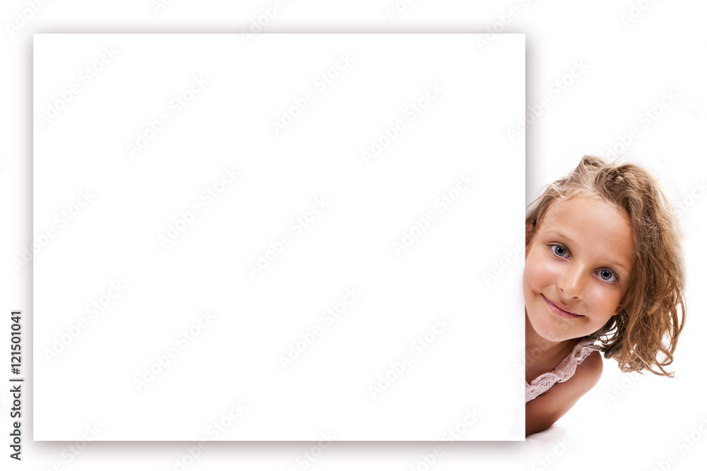 Smiling happy 7 years old girl look outs from the empty banner. Smiling happy 7 years old girl look outs from the empty banner.