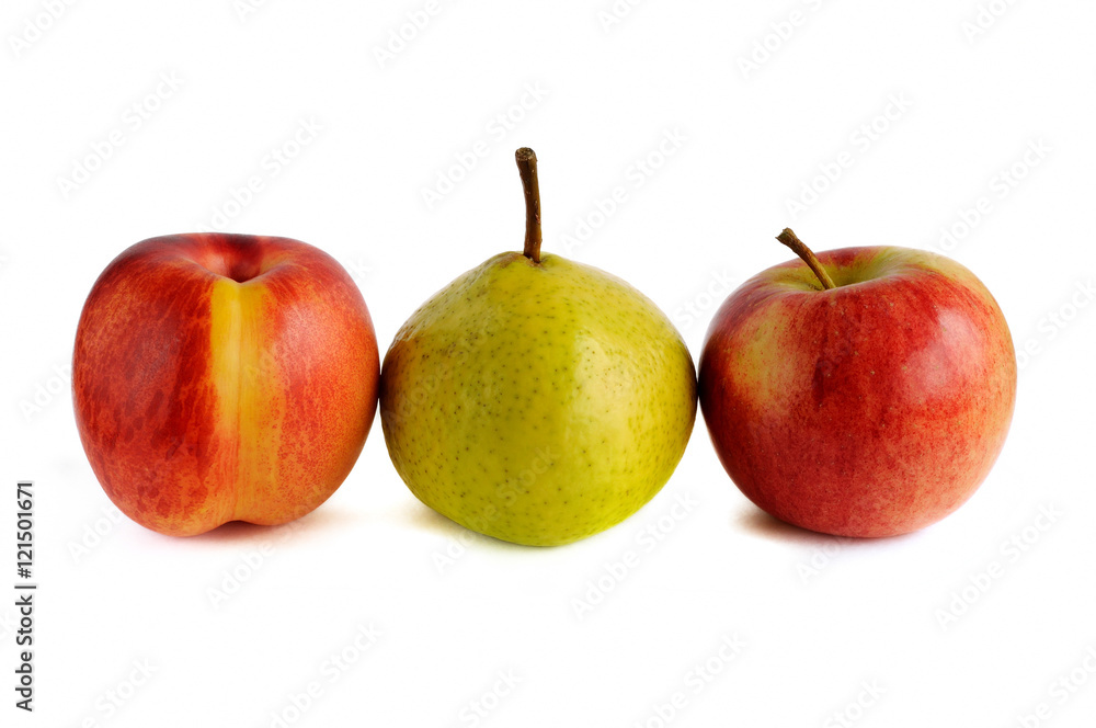 nectarine and pear and apple in a row on a white background nectarine and pear and apple in a row on a white background