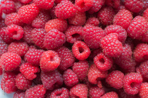 Fresh raspberries background closeup
