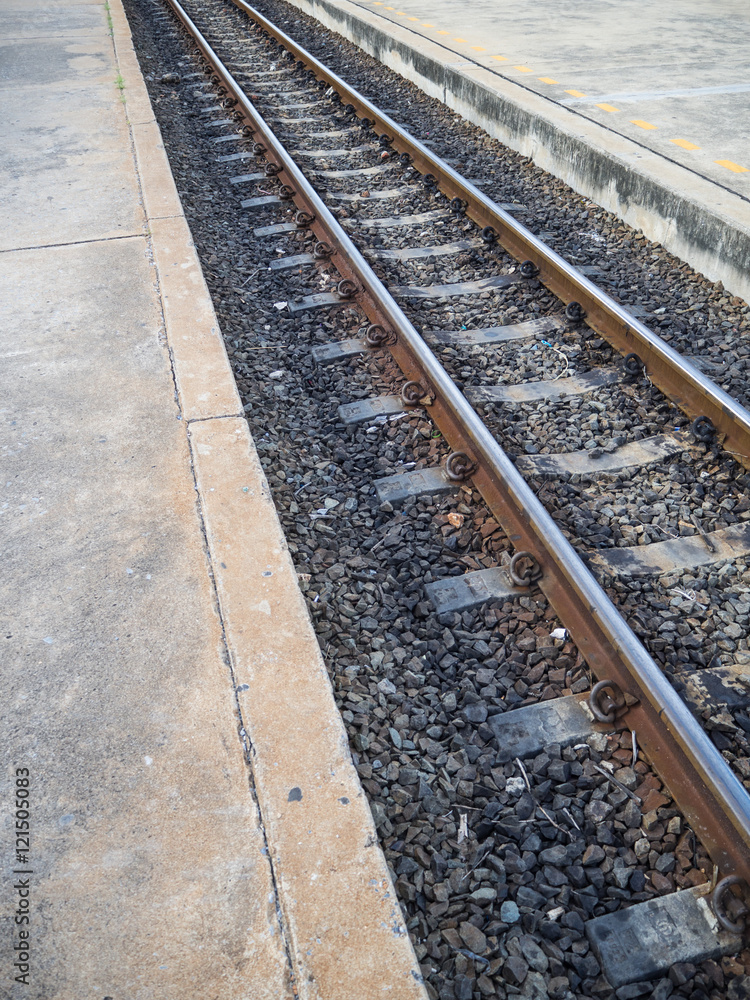 Old, dirty and rusty railway on concrete sleepers Old, dirty and rusty railway on concrete sleepers