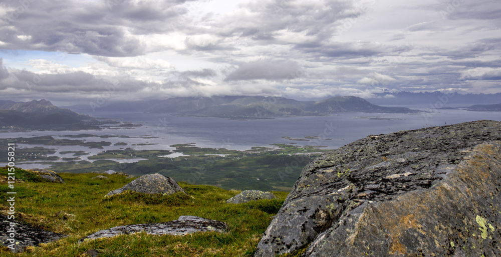 View from the Lynghaug peak in Lofoten Islands, Norway. Trekking in the Norwegian mountains. Beautiful landscapes of Norway. View from the Lynghaug peak in Lofoten Islands, Norway. Trekking in the Norwegian mountains. Beautiful landscapes of Norway.
