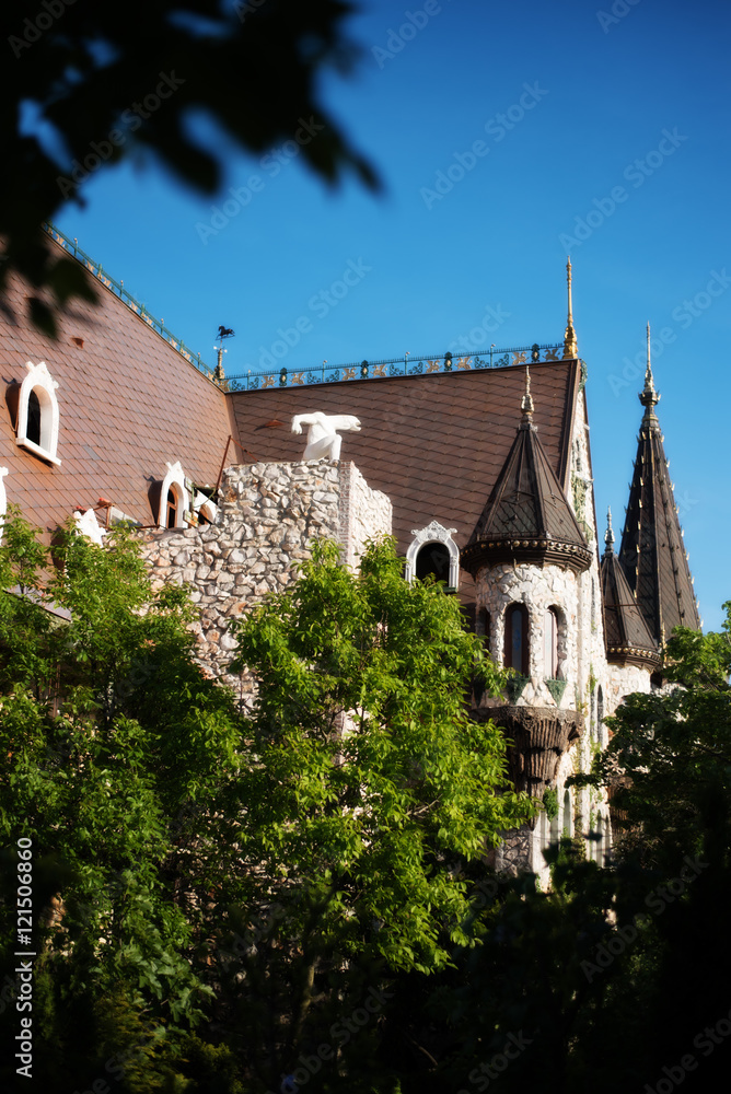 Beautiful old fairy-tale castle near Burgas, Bulgaria. Walls of the castle, green flower garden