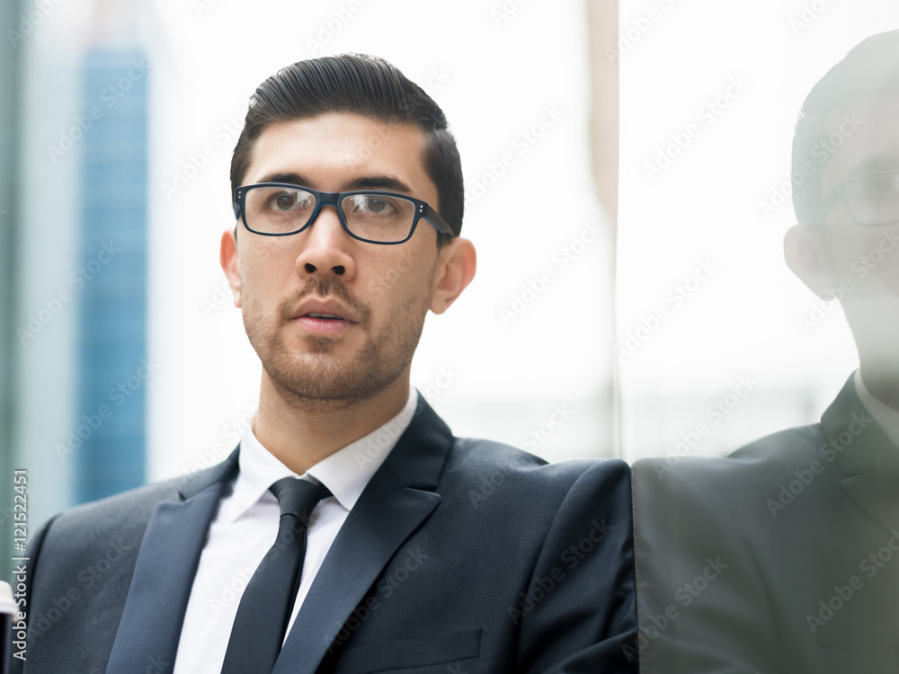 Portrait of handsome businessman outdoor