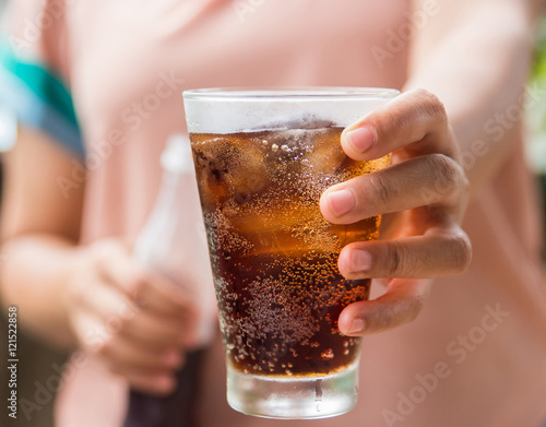 glass of cola with ice.