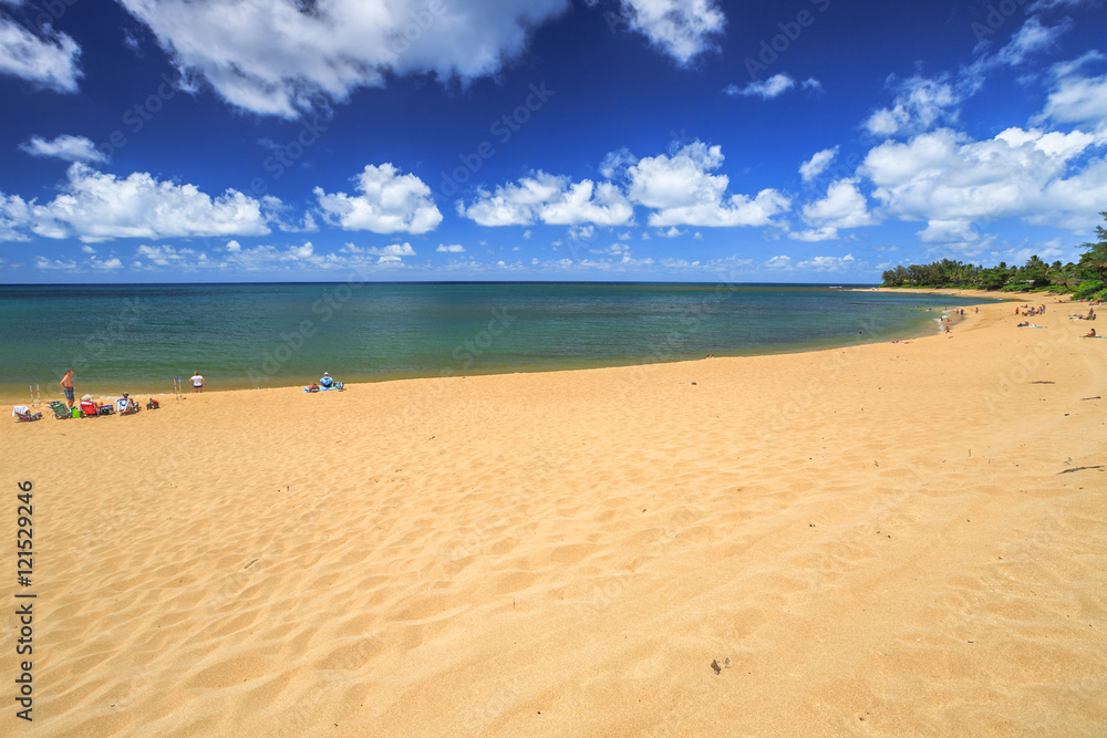The popular Sunset Beach is on the North Shore of Oahu in Hawaii and known for big wave surfing during the winter season with the nearby Banzai Pipeline and Waimea Bay. In summer, the sea is calm.