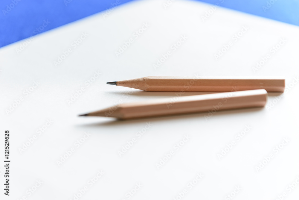 Wooden Pencils on white paper with copy space - Back to school Wooden Pencils on white paper with copy space - Back to school