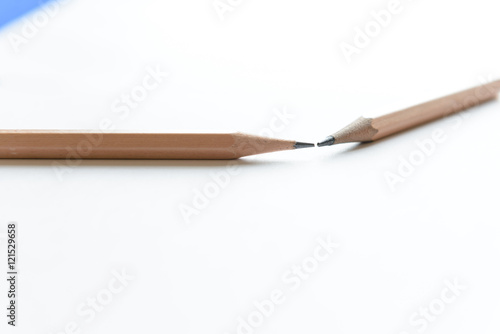 Wooden Pencils on white paper with copy space - Back to school