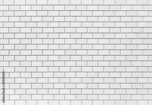 White brick tile wall seamless background and texture..