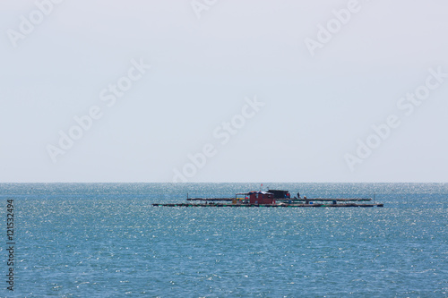 nautical fishing coracles on sea, tribal boats photo