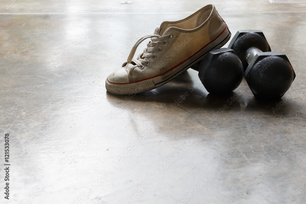 sport shoe and metal dumbbell, fitness sport equipment