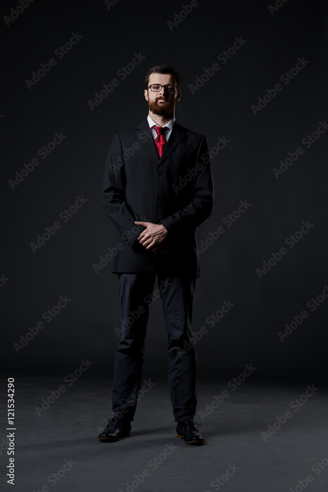 Businessman on a black background Businessman on a black background