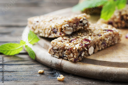 Fotografija Granola bar on wooden background