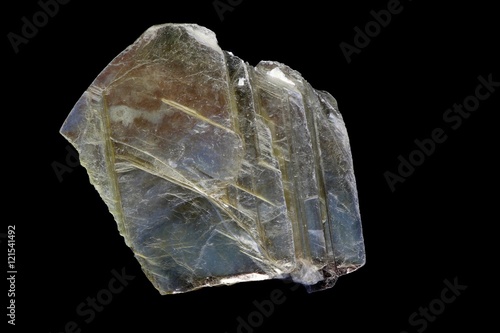 Muscovite, a mica mineral.  Muscovite is an aluminium mineral forming perfect elastic sheets.