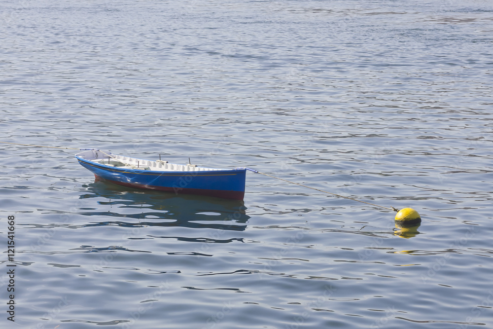 Naklejka premium Small fishing boat at the sea