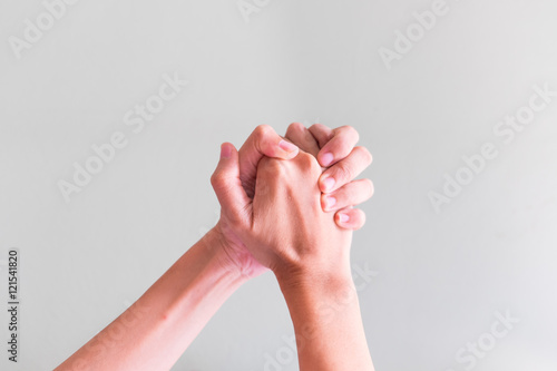 two hands hold together