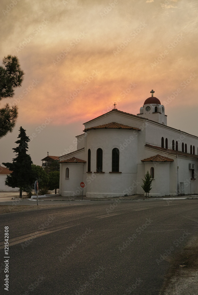 Limanaria church at sunset and smoke Thassos fire 2016