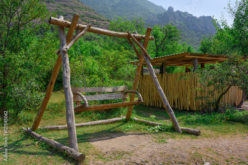 wooden swing in the mountains