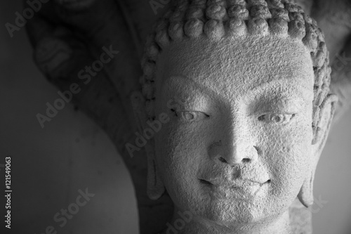 Sandstone Buddha statue in Thailand.Black and white