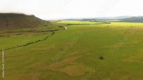 Fying over the Kamarata Valley at Uruyen with the Auyan Tepui at the background. La Gran Sabana, Venezuela