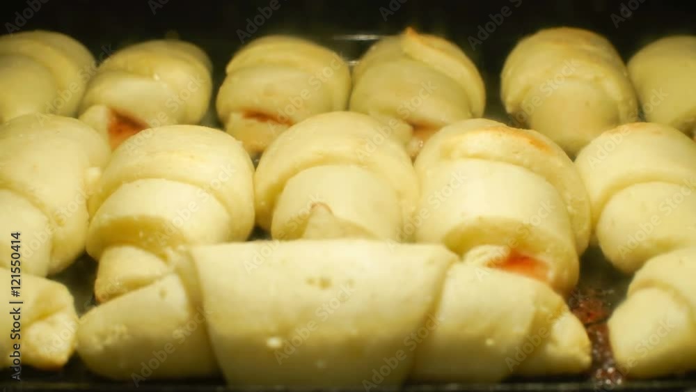 Homemade buns are baked in the oven, 4K time-lapse Homemade buns are baked in the oven, 4K time-lapse