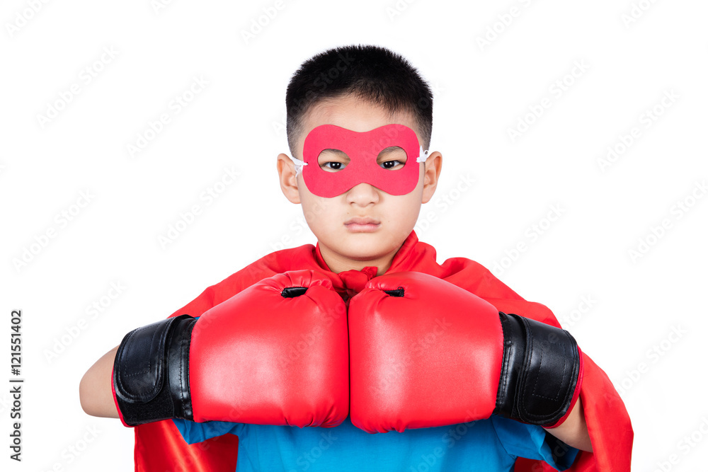 Asian Chinese boy wearing super hero costume with boxing gloves Asian Chinese boy wearing super hero costume with boxing gloves