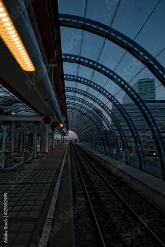 Converging lines in a metrostation in Amsterdam, The Netherlands photo
